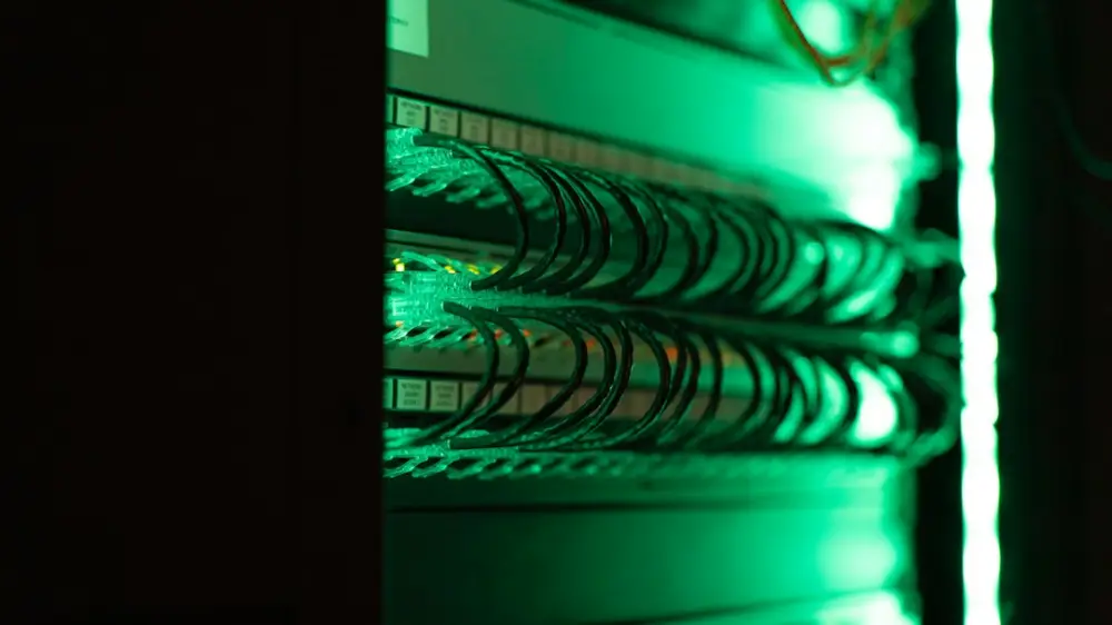 A close up of a server in a server room, illustrating high availability hosting